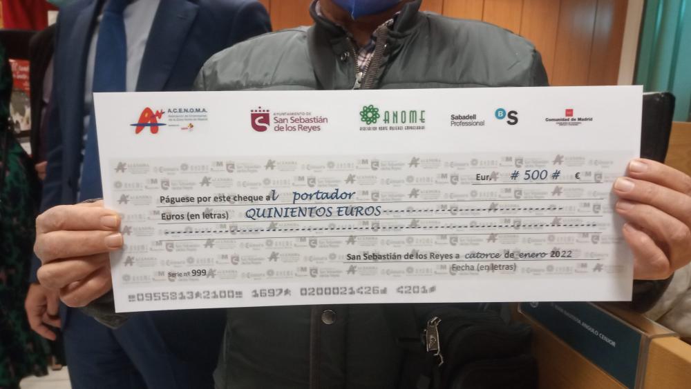 Cheque del Premio al Comrador de 2022
